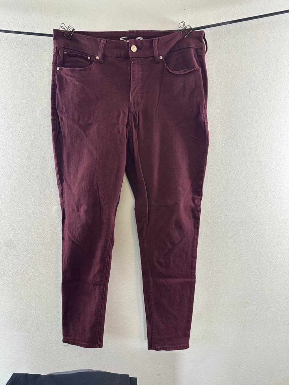 Seven7 brand cranberry colored jeans in a size 16.  They have stretch in them